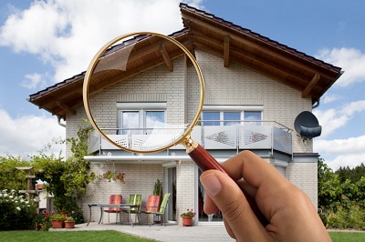 image of house through magnifying glass